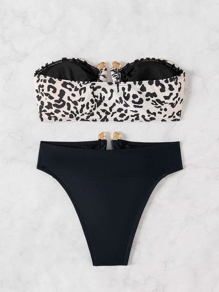 Black 1970s Leopard Metal Button Strapless Swimsuit — because 1970s glamour never goes out of style