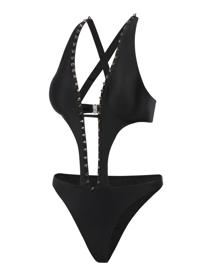 This Black 1970s Studded Cutout One-Piece Swimsuit carries 1970s vacation dreams in every stitch
