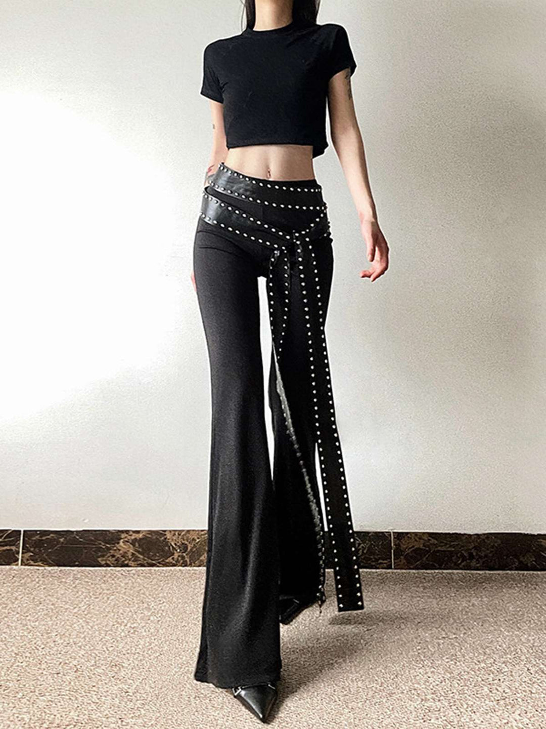 Black 1980s Steampunk Bootcut Rivet Pants — 1980s style for the woman going places