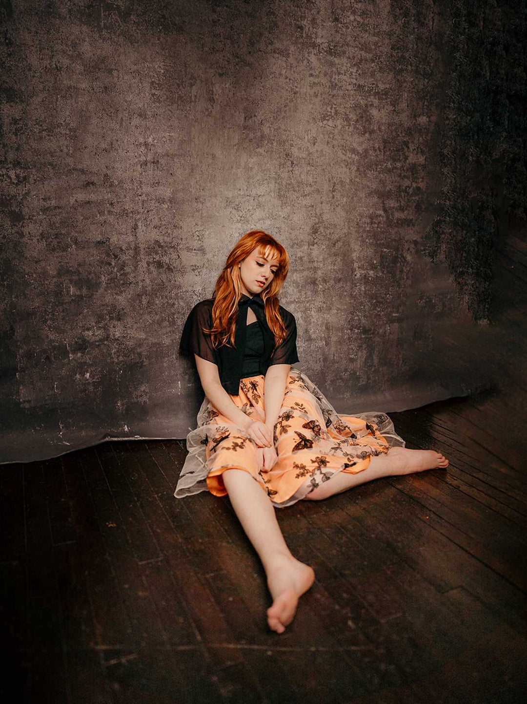 She slips into this Black &amp; Orange 1950s 3D Butterfly Cloak Dress and suddenly it&