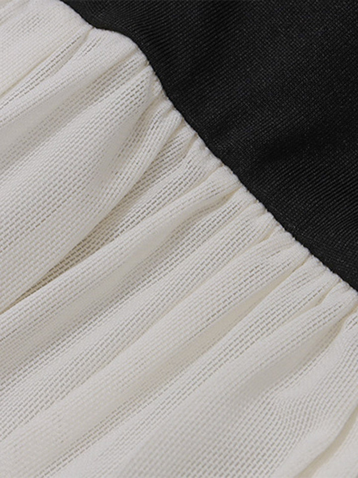 This Black &amp; White 1950s Off-Shoulder Skater Dress wraps her in 1950s elegance, one twirl at a time