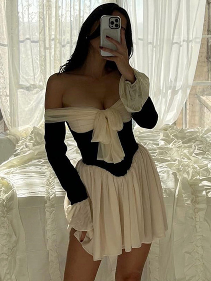 This Black &amp; White 1950s Off-Shoulder Skater Dress wraps her in 1950s elegance, one twirl at a time