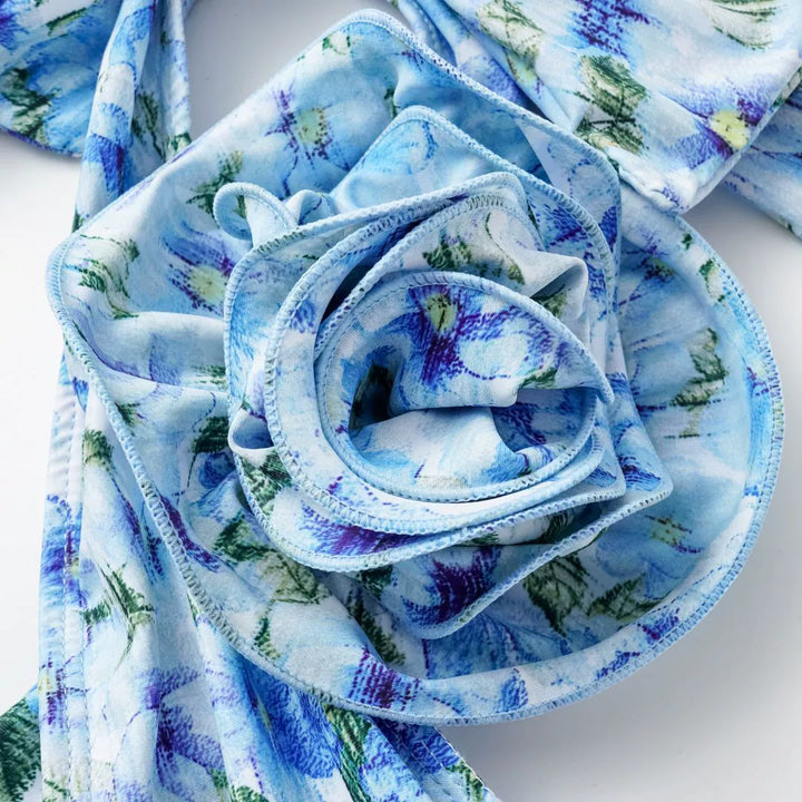 This Blue 1930s Halter Floral Print 3D Rose Swimsuit carries 1930s vacation dreams in every stitch
