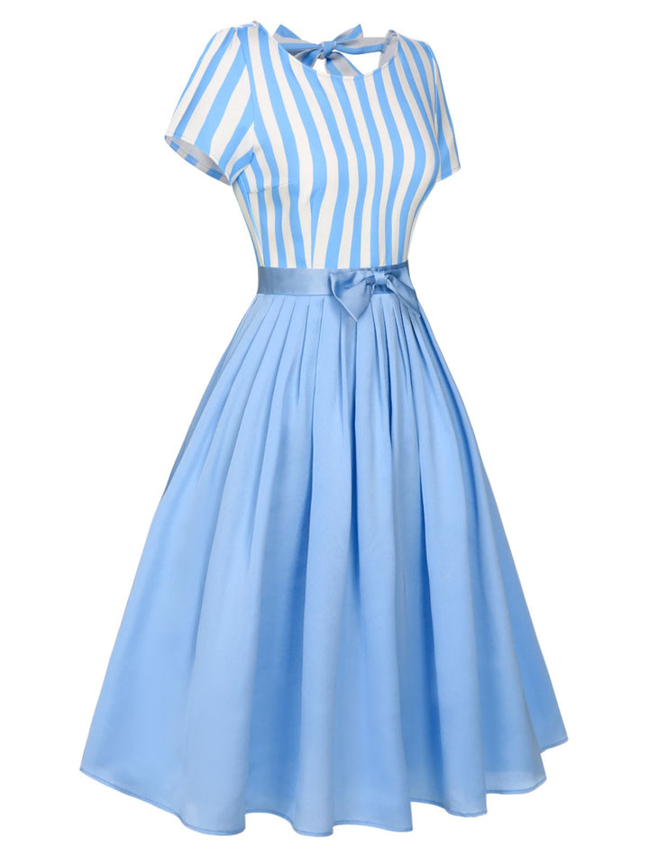 This Blue 1940s Boat Neck Stripes Bow Dress wraps her in 1940s elegance, one twirl at a time