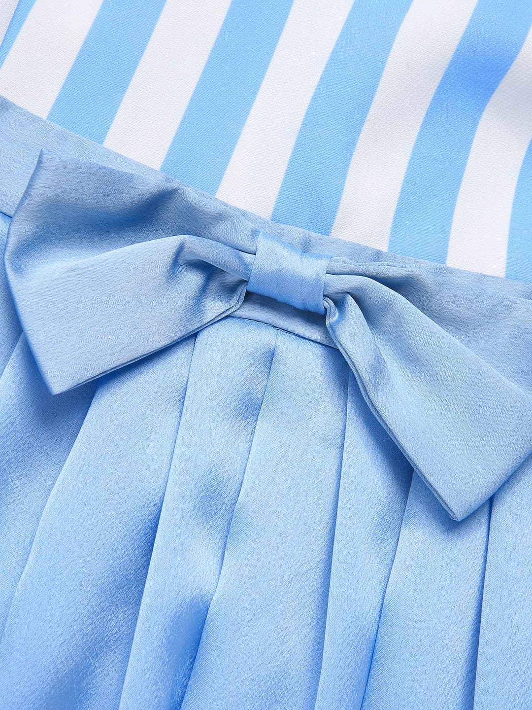 She slips into this Blue 1940s Boat Neck Stripes Bow Dress and suddenly it&
