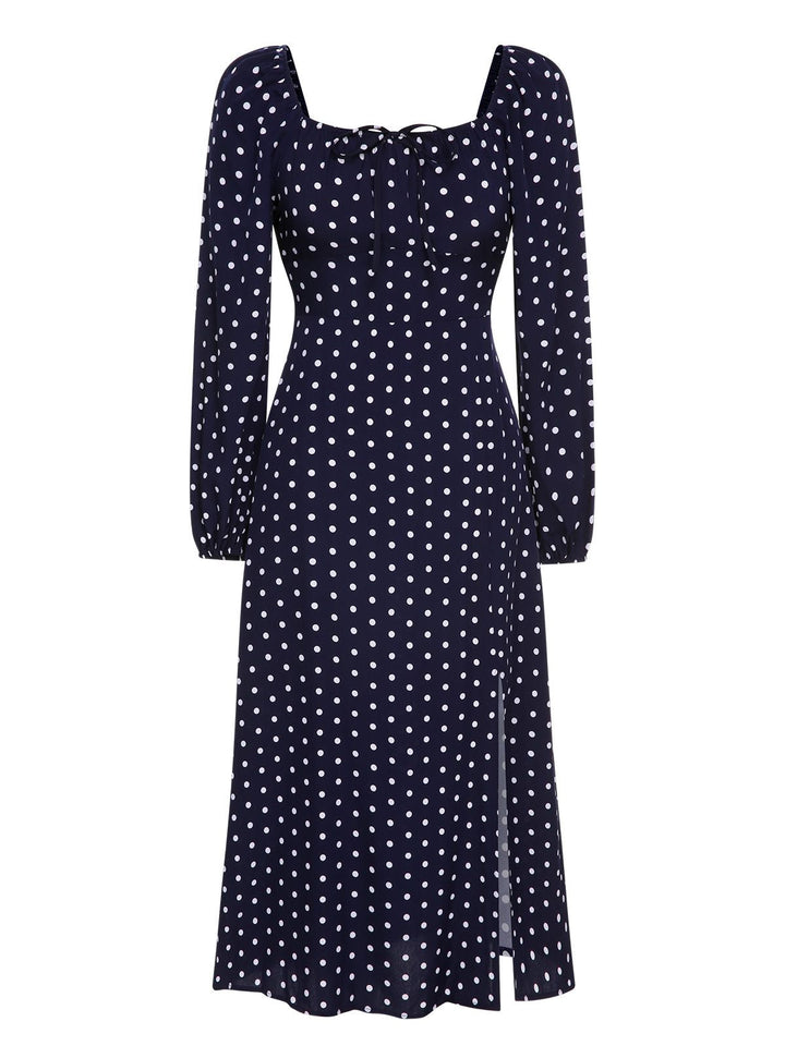 She slips into this Blue 1940s Lantern Sleeve Polka Dots Dress and suddenly it&