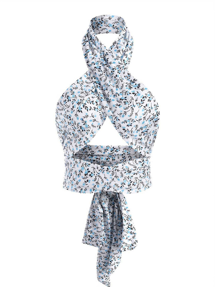 She pairs this Blue 1950s Ditsy Floral Lace-Up Crop Camisole with confidence and 1950s charm