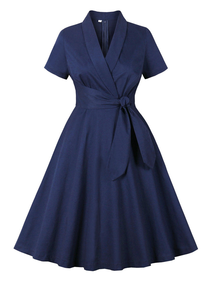 She slips into this Blue 1950s Lapel Waist-Tie Cotton Dress and suddenly it&