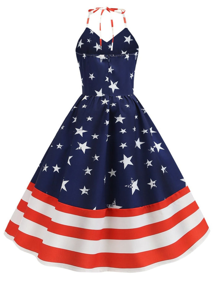 This Blue 1950s Stars &amp; Stripes Swing Dress wraps her in 1950s elegance, one twirl at a time
