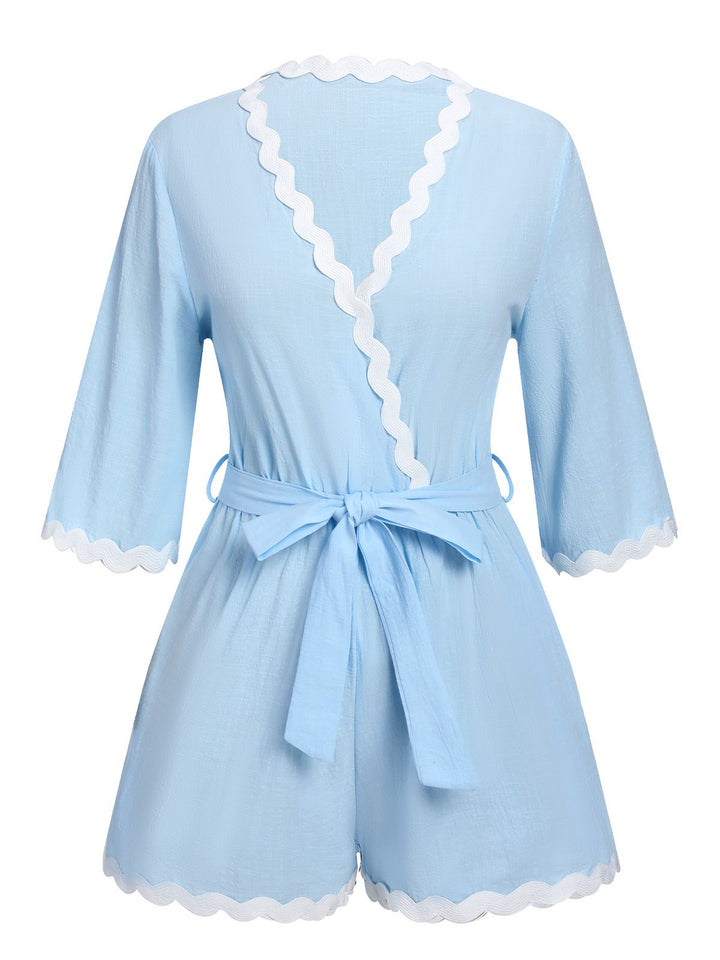 She adds this Blue 1950s V-Neck Solid Belted Romper and suddenly it&