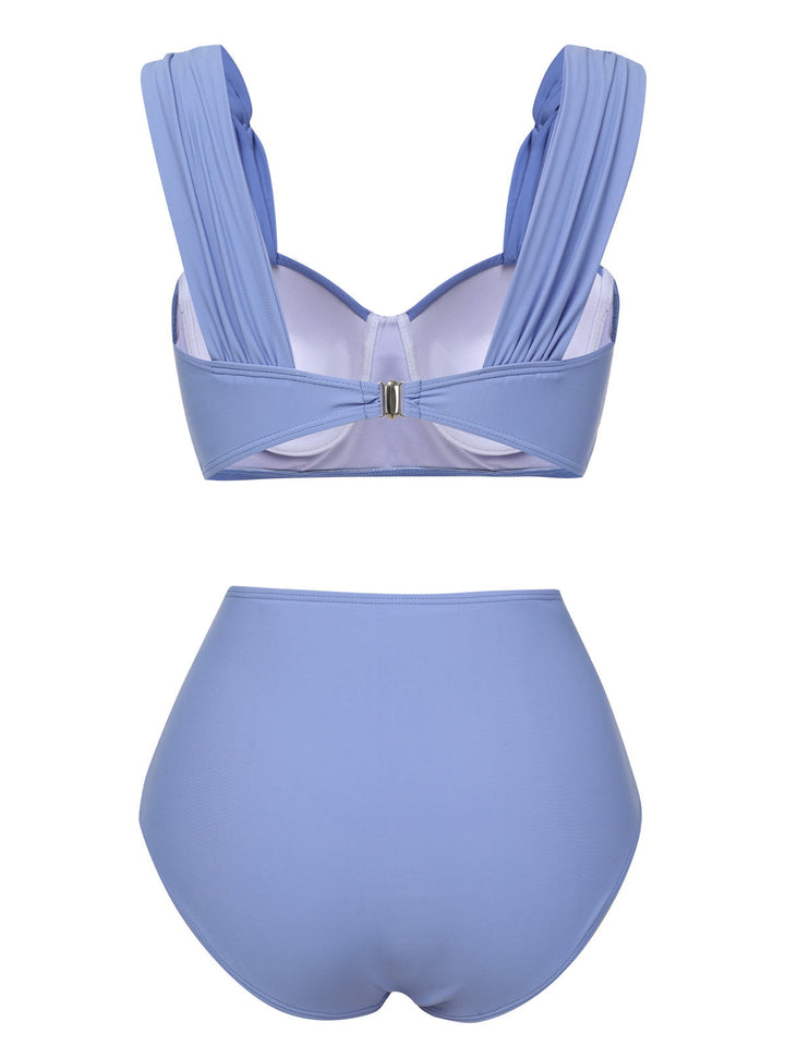 This Blue Grey 1960s Wide Strap Wrinkle Swimsuit carries 1960s vacation dreams in every stitch