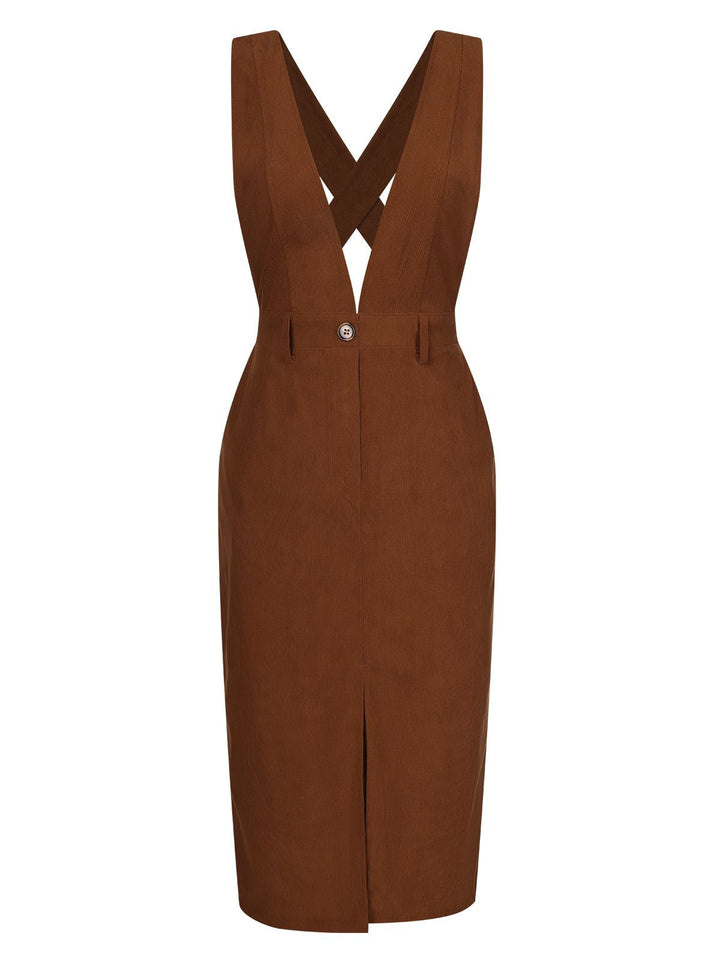 She slips into this Brown 1960s V-Neck Cross-Back Pinafore Dress and suddenly it&