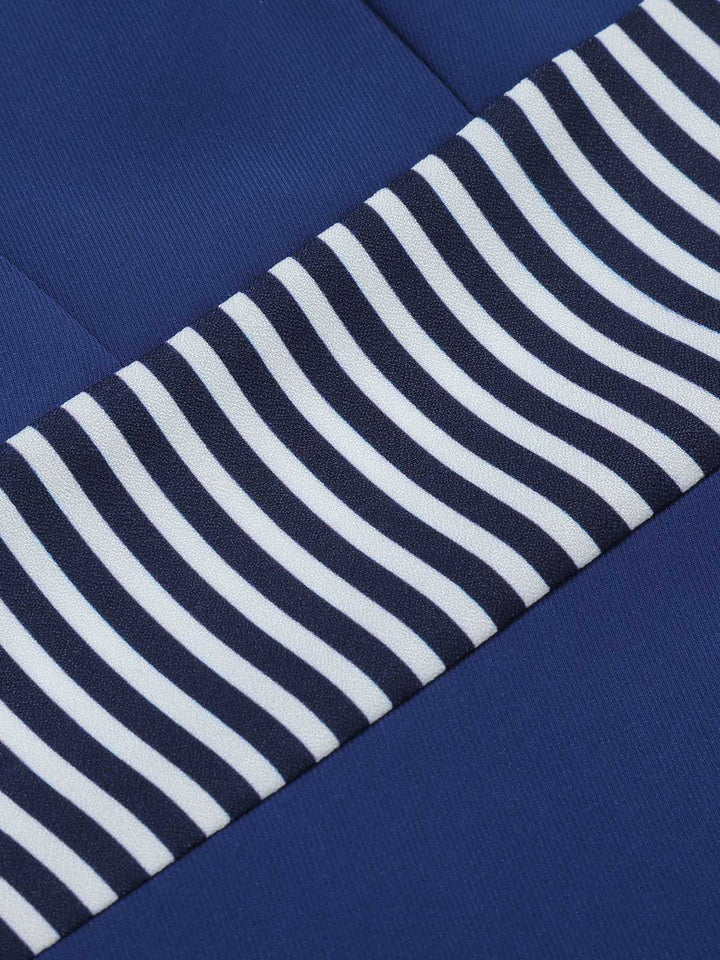 She slips into this Dark Blue 1960s Buttoned Stripes Dress and suddenly it&