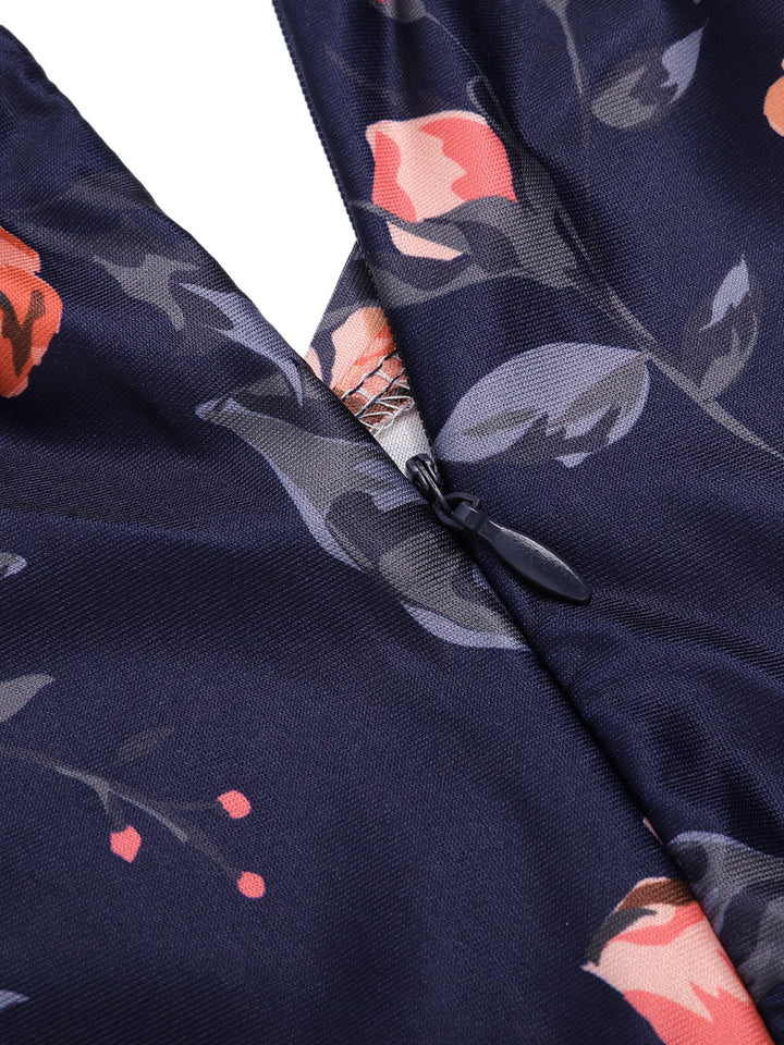 This Dark Blue 1960s Off-Shoulder Floral Jumpsuit whispers 1960s secrets to those who notice