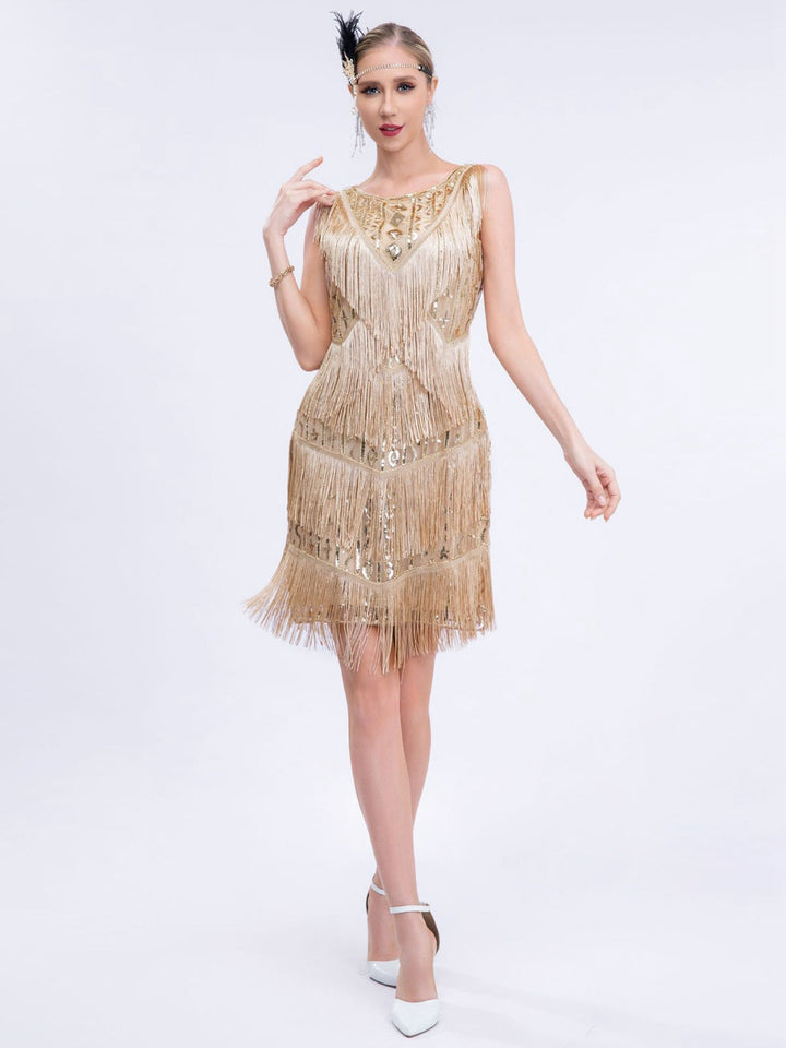 She slips into this Gold 1920s Gatsby Sequins Tassel Patchwork Dress and suddenly it&