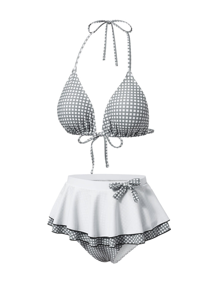 This Gray &amp; White 1940s Gingham Plaid Bow Halter Swimsuit carries 1940s vacation dreams in every stitch