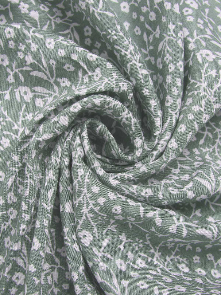 Green 1940s Ditsy Floral Flounce Sleeve Dress — the kind of 1940s dress that makes strangers smile