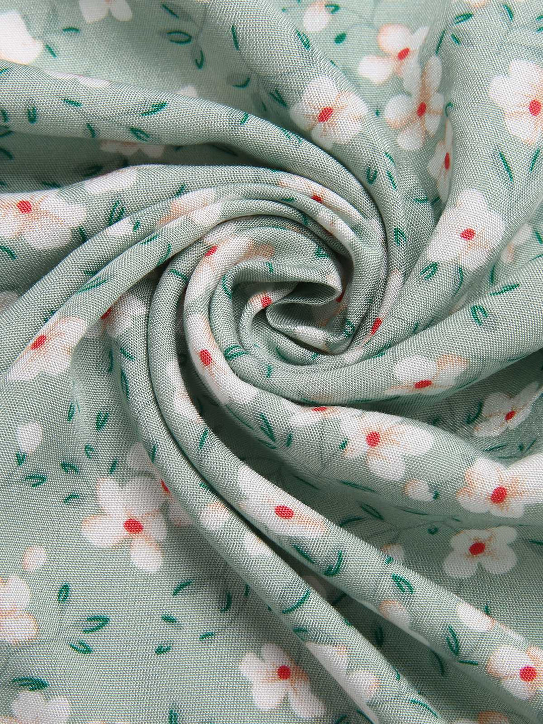 Green 1940s V-Neck Ditsy Floral Irregular Hem Dress — the kind of 1940s dress that makes strangers smile