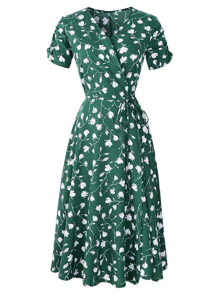 She slips into this Green 1940s V-Neck Floral Dress and suddenly it&