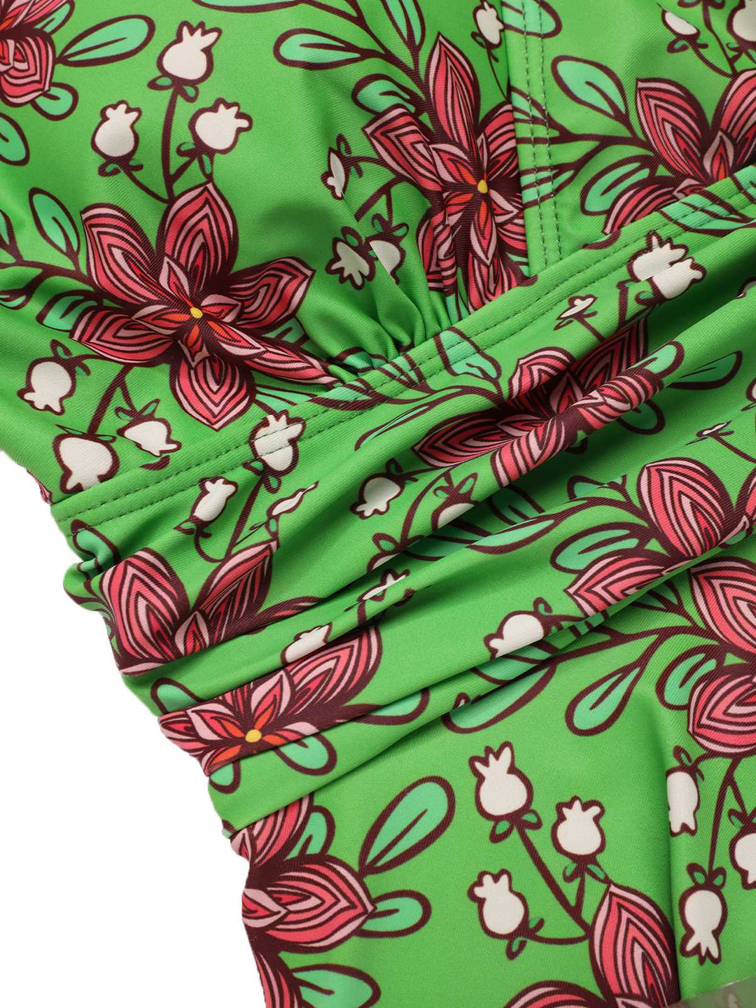 This Green 1940s V-Neck Floral Ruched-Waist Swimsuit carries 1940s vacation dreams in every stitch