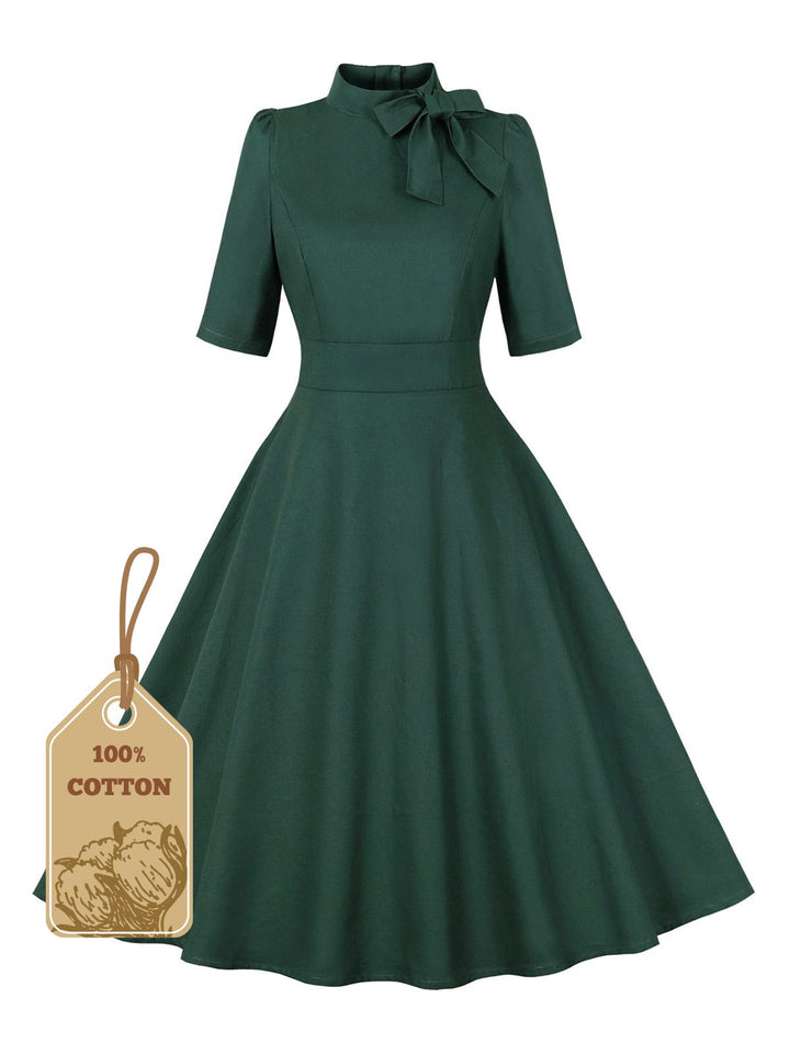 She slips into this Green 1950s Cotton Tie Elbow Sleeves Dress and suddenly it&