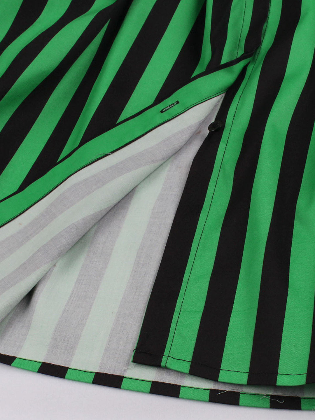 She slips into this Green 1950s Tie Neck Button Black Stripes Dress and suddenly it&