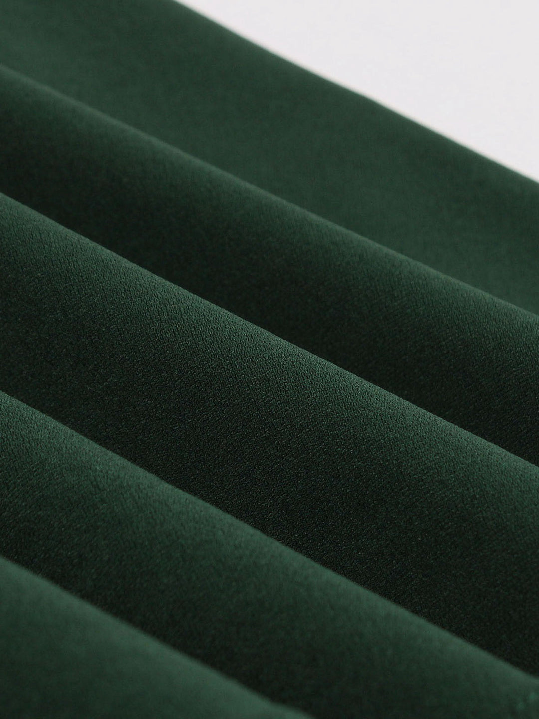 She slips into this Green 1950s Tie Neck Contrast Patchwork Dress and suddenly it&