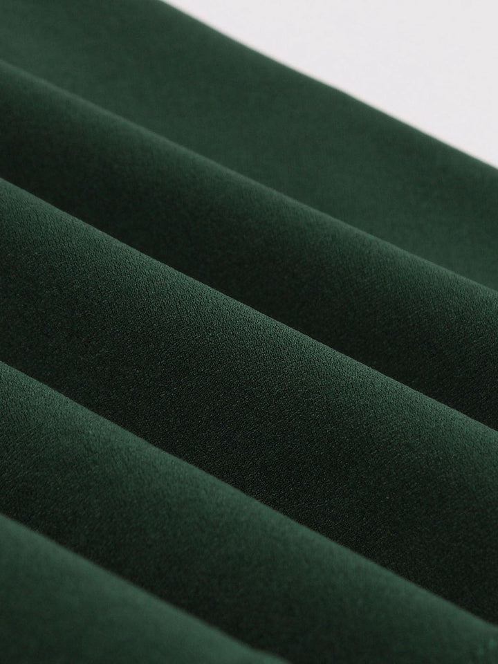 She slips into this Green 1950s Tie Neck Contrast Patchwork Dress and suddenly it&