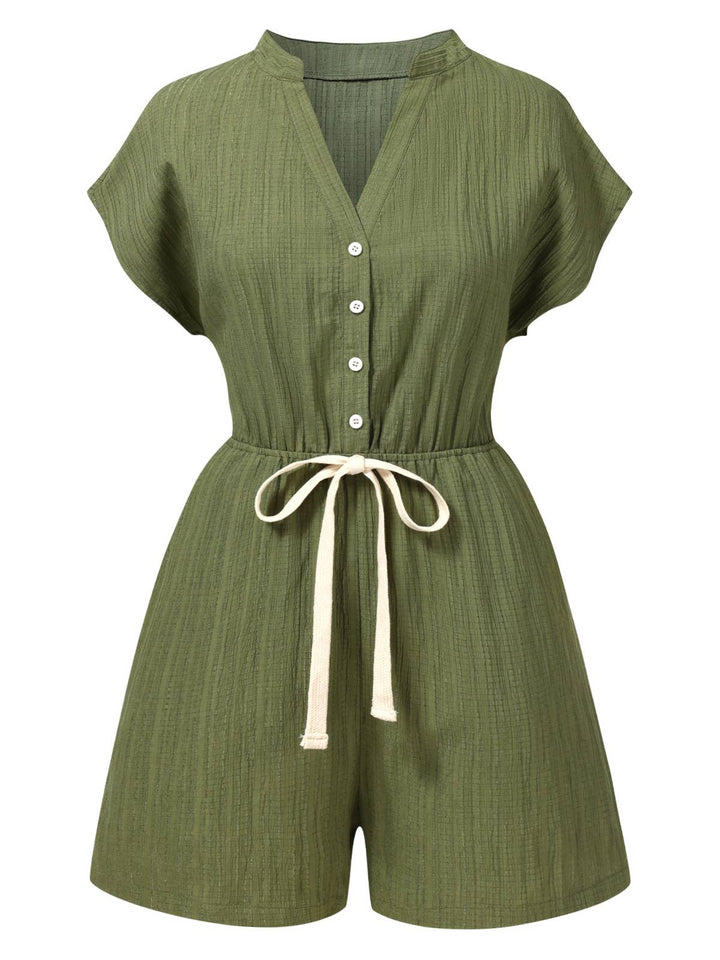 She finds her 1950s story in this Green 1950s V-Neck Textured Pocket Romper