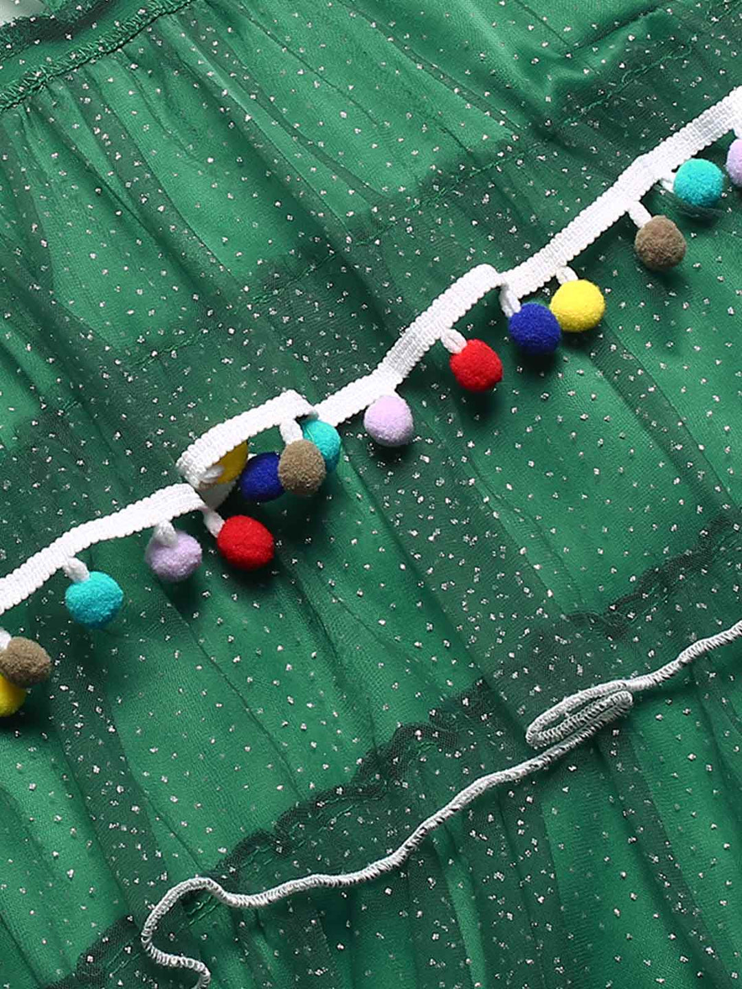 Green 1960s Pom-Pom Christmas Tree Dress — a 1960s silhouette that turns sidewalks into runways