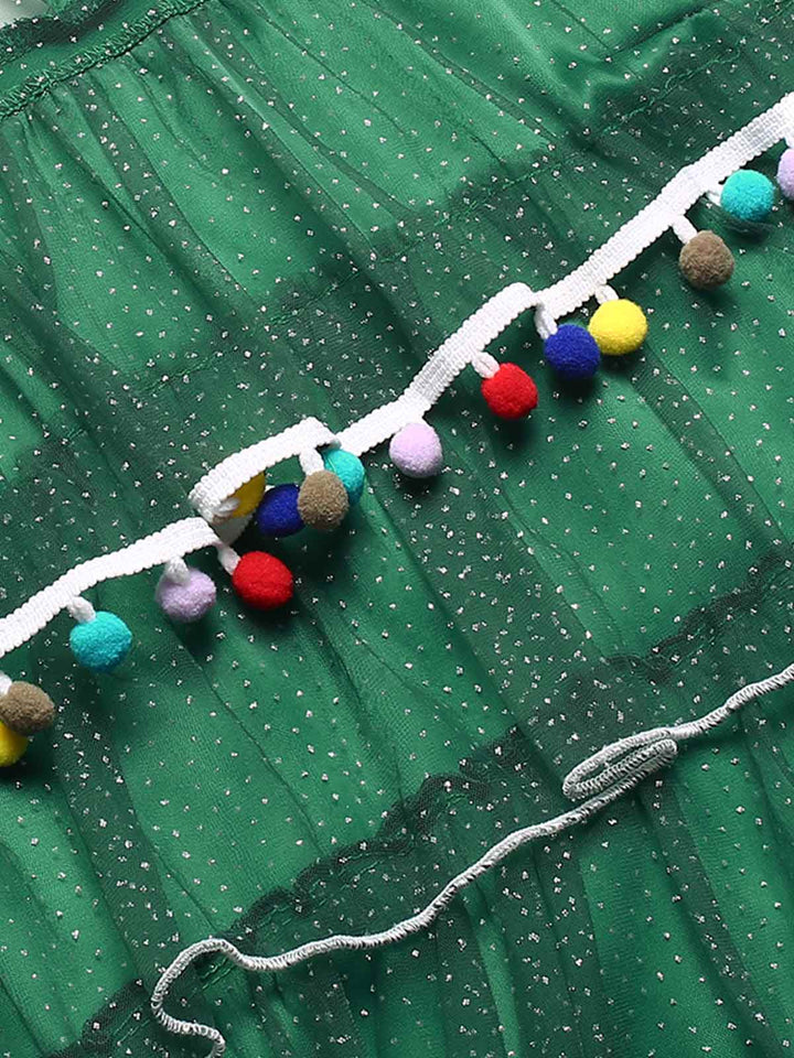 Green 1960s Pom-Pom Christmas Tree Dress — a 1960s silhouette that turns sidewalks into runways