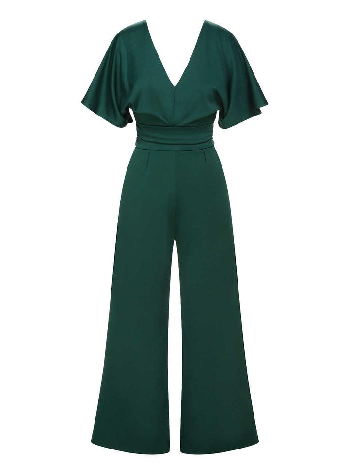 She finds her 1960s story in this Green 1960s V-Neck High Waist Wide-Leg Jumpsuit
