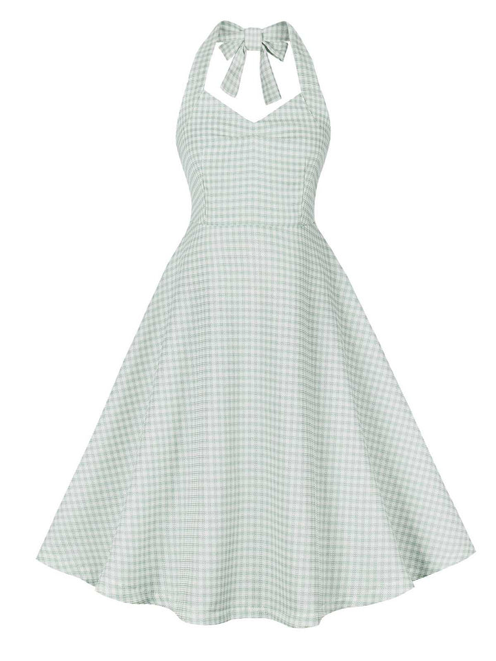 She slips into this Green Gray 1950s Halter Plaids Dress and suddenly it&