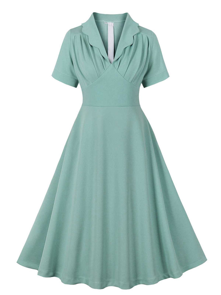 She slips into this Green Gray 1950s Lapel Solid Dress and suddenly it&