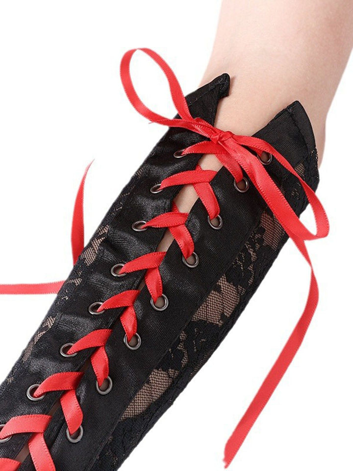 She adds this Halloween Punk Party Lace-Up Half Finger Gloves and suddenly it&