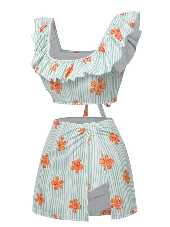 This Light Green 1950s Floral Stripe Swimsuit &amp; Skirt Cover-Up carries 1950s vacation dreams in every stitch