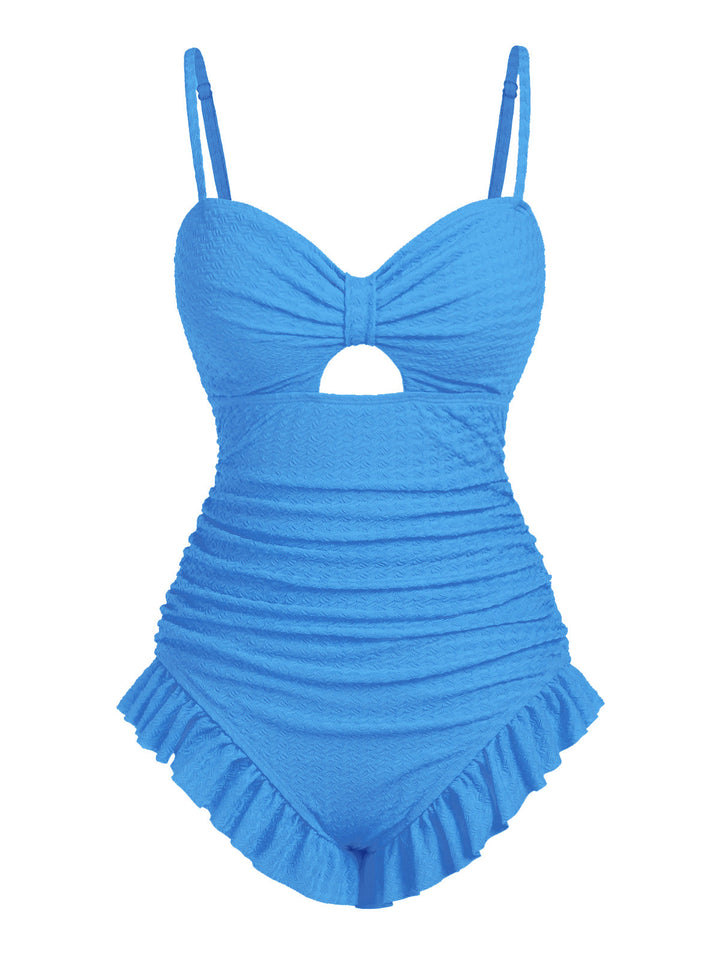Pale Solid Ruched Swimsuit — because glamour never goes out of style