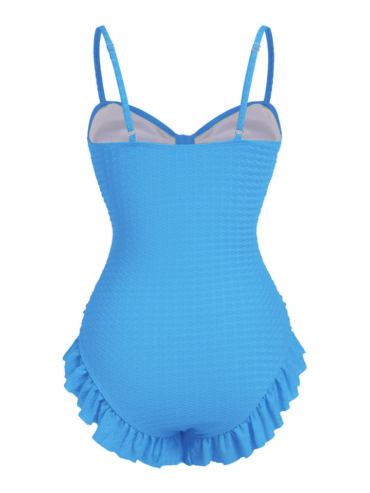 Pale Solid Ruched Swimsuit — because glamour never goes out of style