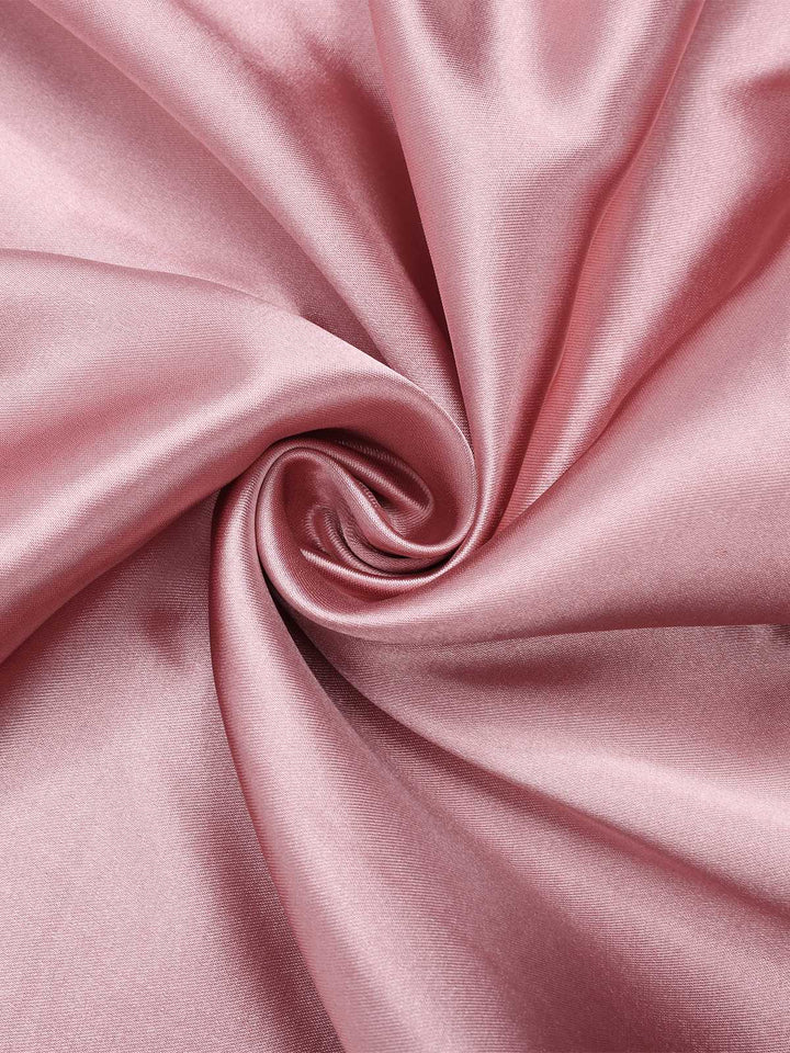 This Pink Solid Satin Slit Suspender Nightdress wraps her in elegance, one twirl at a time
