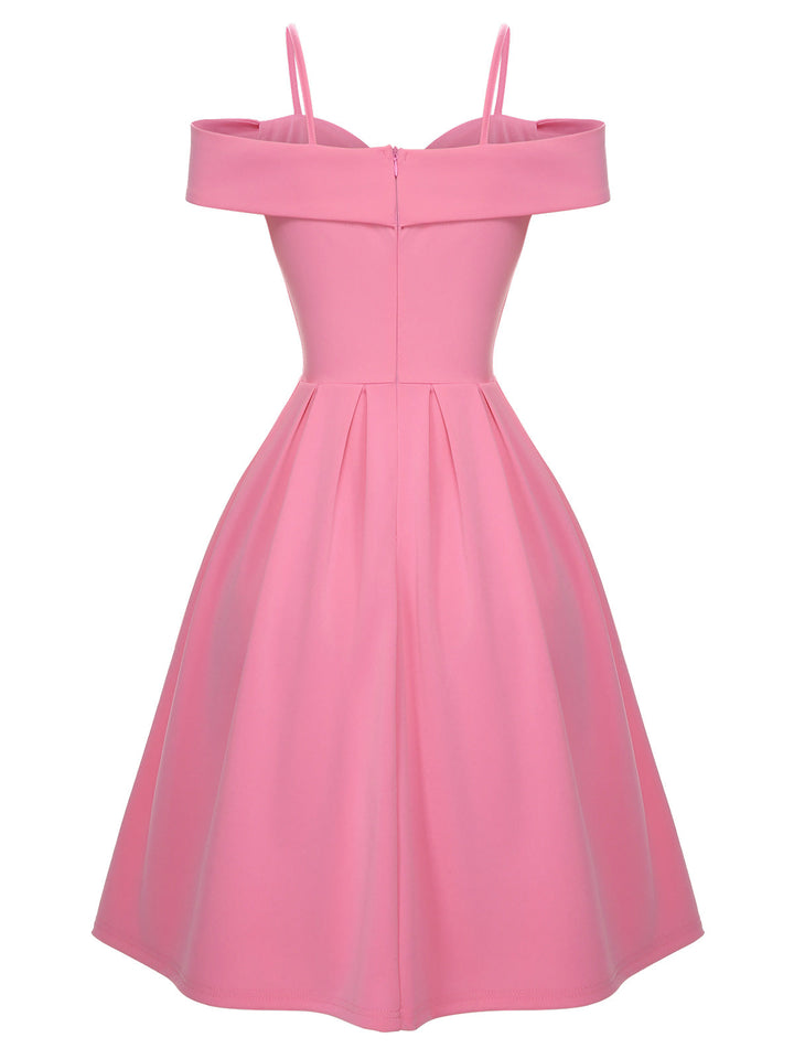 This Pink 1950s Cold Shoulder Solid Dress wraps her in 1950s elegance, one twirl at a time
