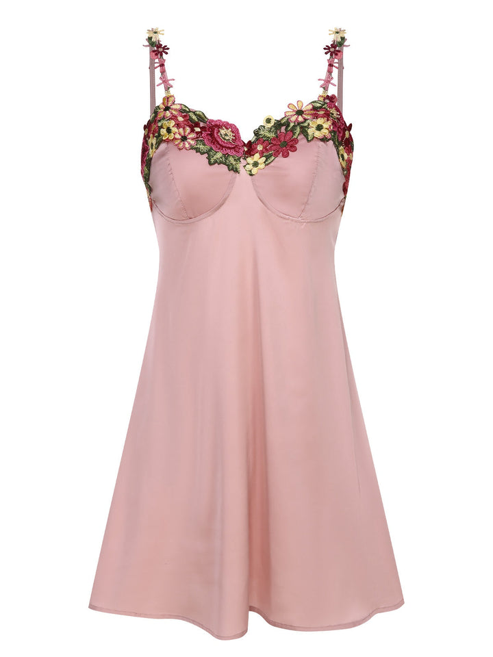 She slips into this Pink Flower Embroidered Suspender Nightgown and suddenly it&