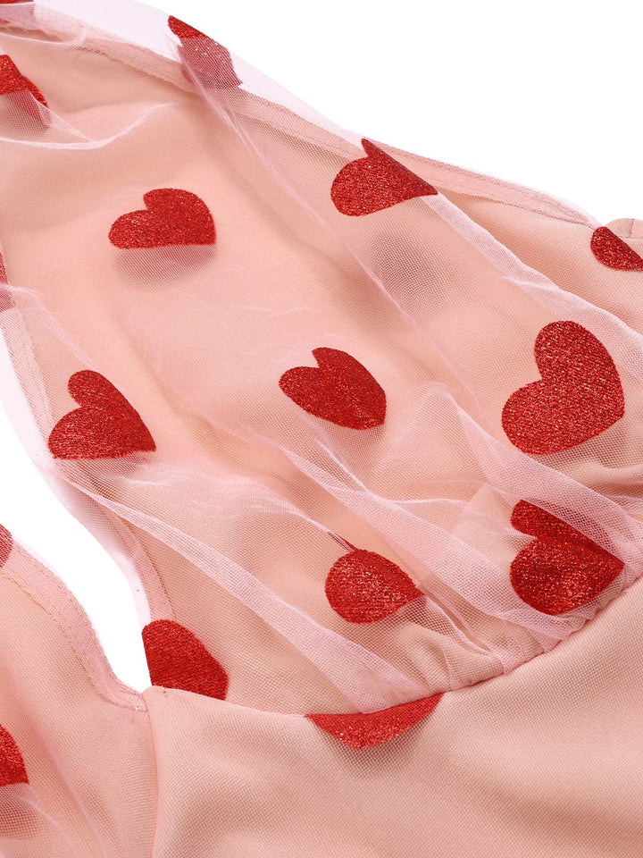 She slips into this Pink 1950s Halter Heart Mesh Dress and suddenly it&