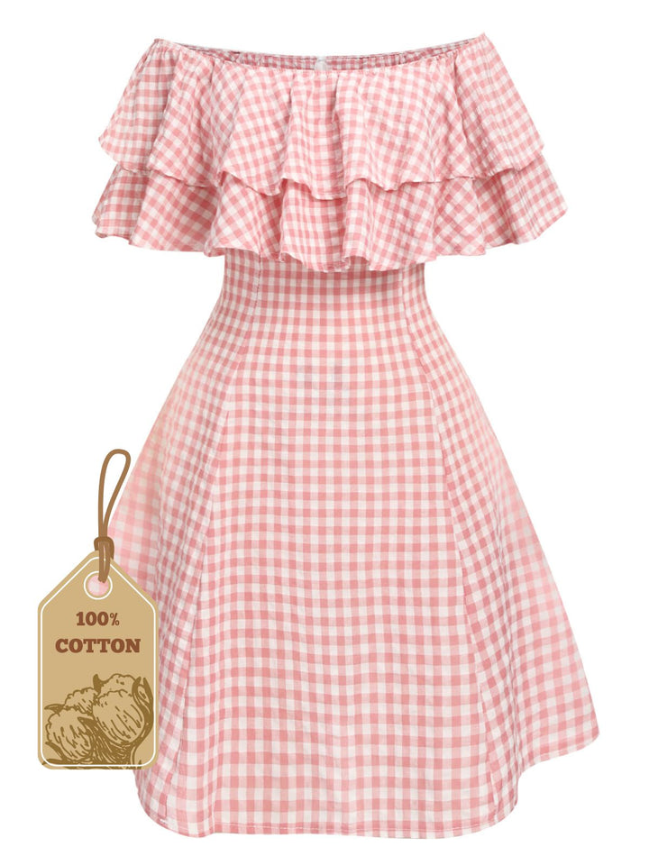 She slips into this Pink 1950s Plaid Cotton Off-Shoulder Dress and suddenly it&