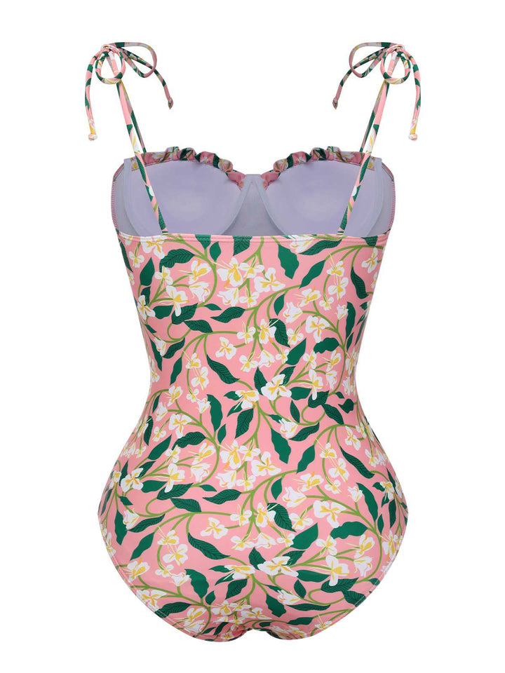 This Pink 1950s Spaghetti Strap Plants Print Swimsuit carries 1950s vacation dreams in every stitch