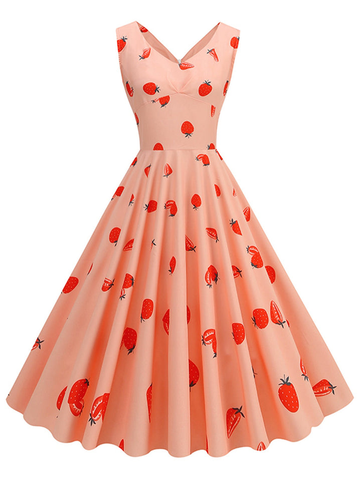 She slips into this Pink 1950s Strawberry Sleeveless Swing Dress and suddenly it&
