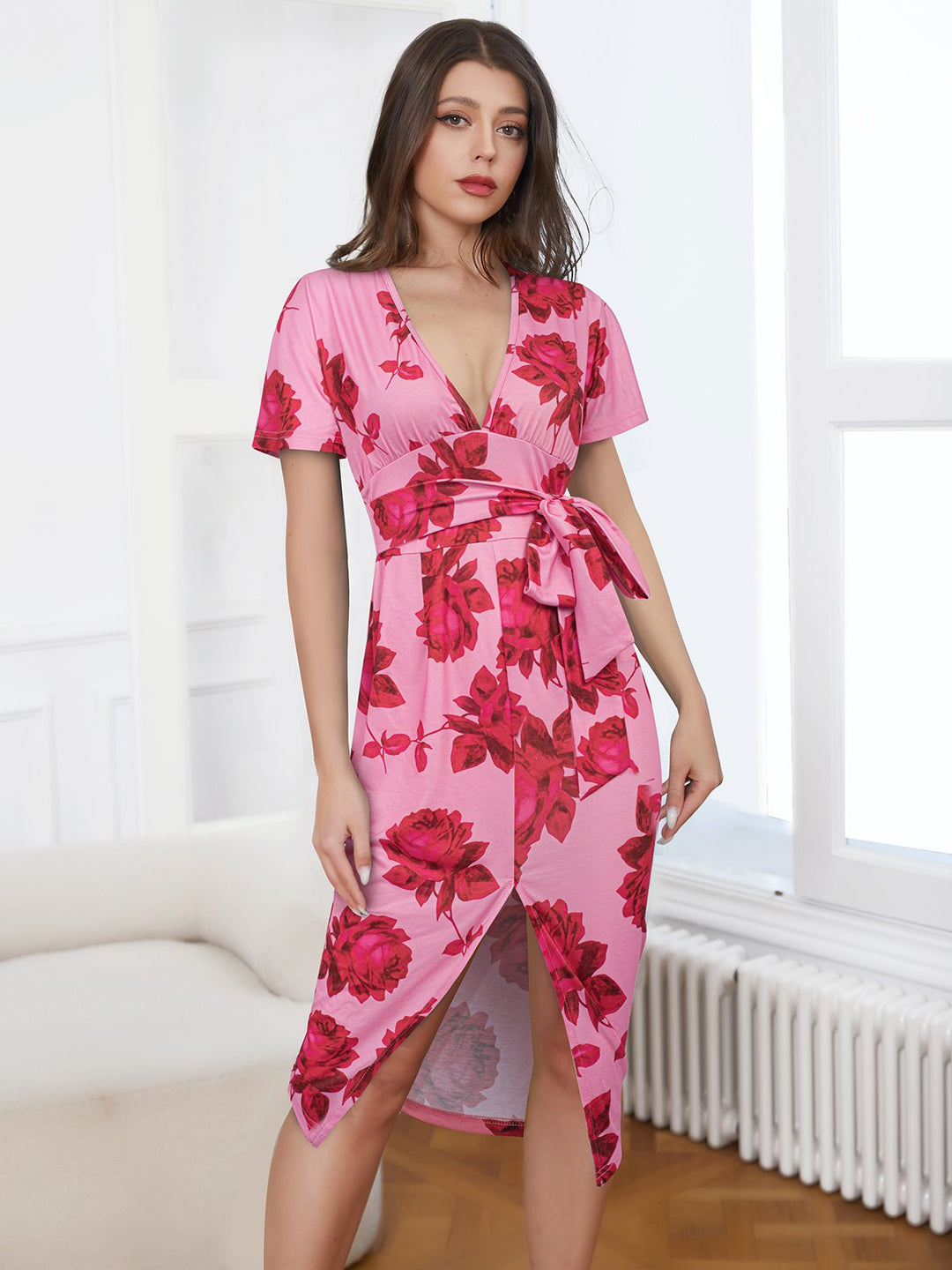 She slips into this Pink 1960s V-Neck Floral Tie Split Dress and suddenly it&