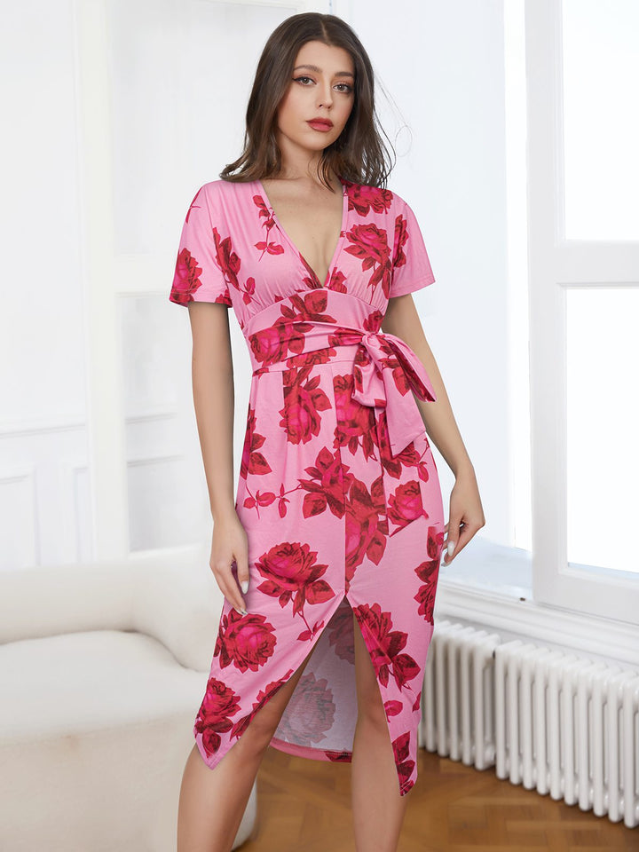 She slips into this Pink 1960s V-Neck Floral Tie Split Dress and suddenly it&
