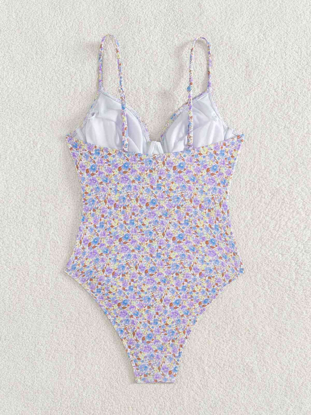 Purple 1950s Ditsy Floral Lace-Up One-Piece Swimsuit — because 1950s glamour never goes out of style