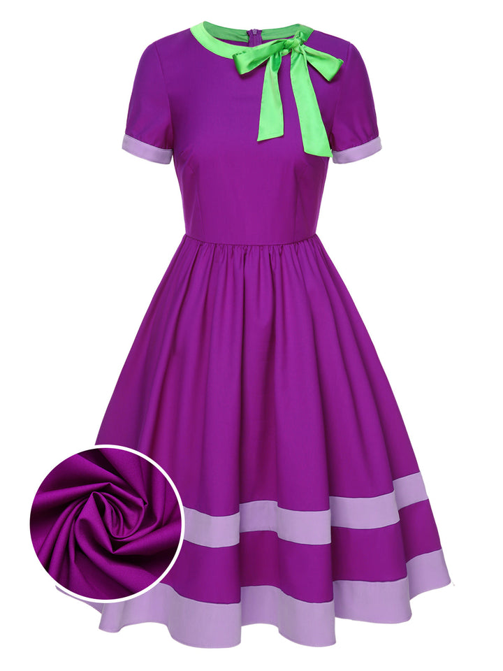 She slips into this Purple 1950s Solid Spliced Tie Neck Dress and suddenly it&