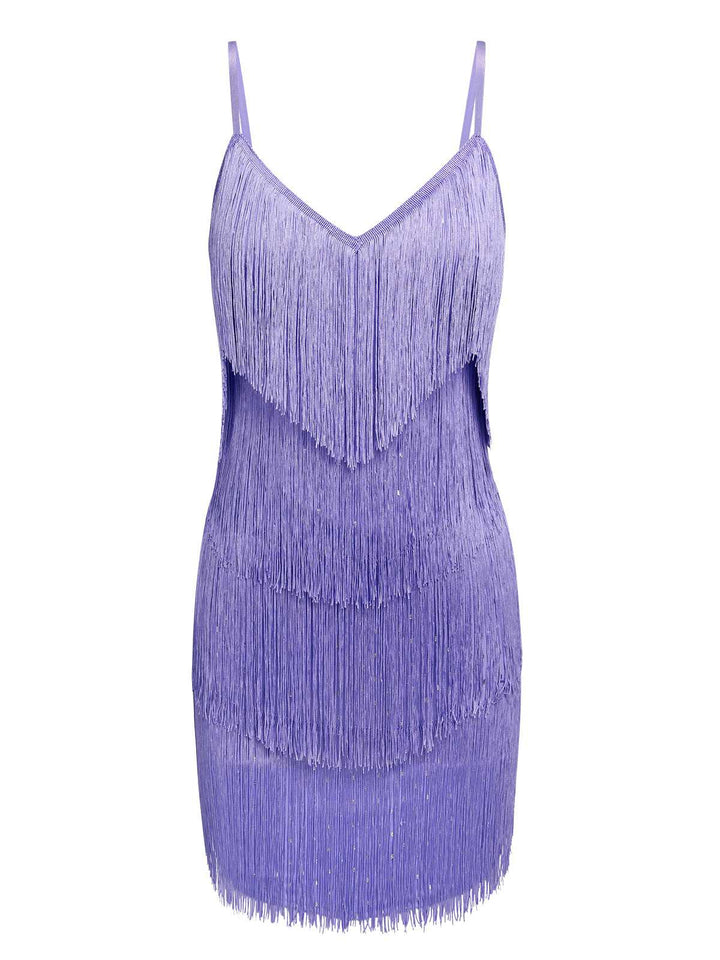 She slips into this Purple 1960s Spaghetti Strap Fringe Dress and suddenly it&